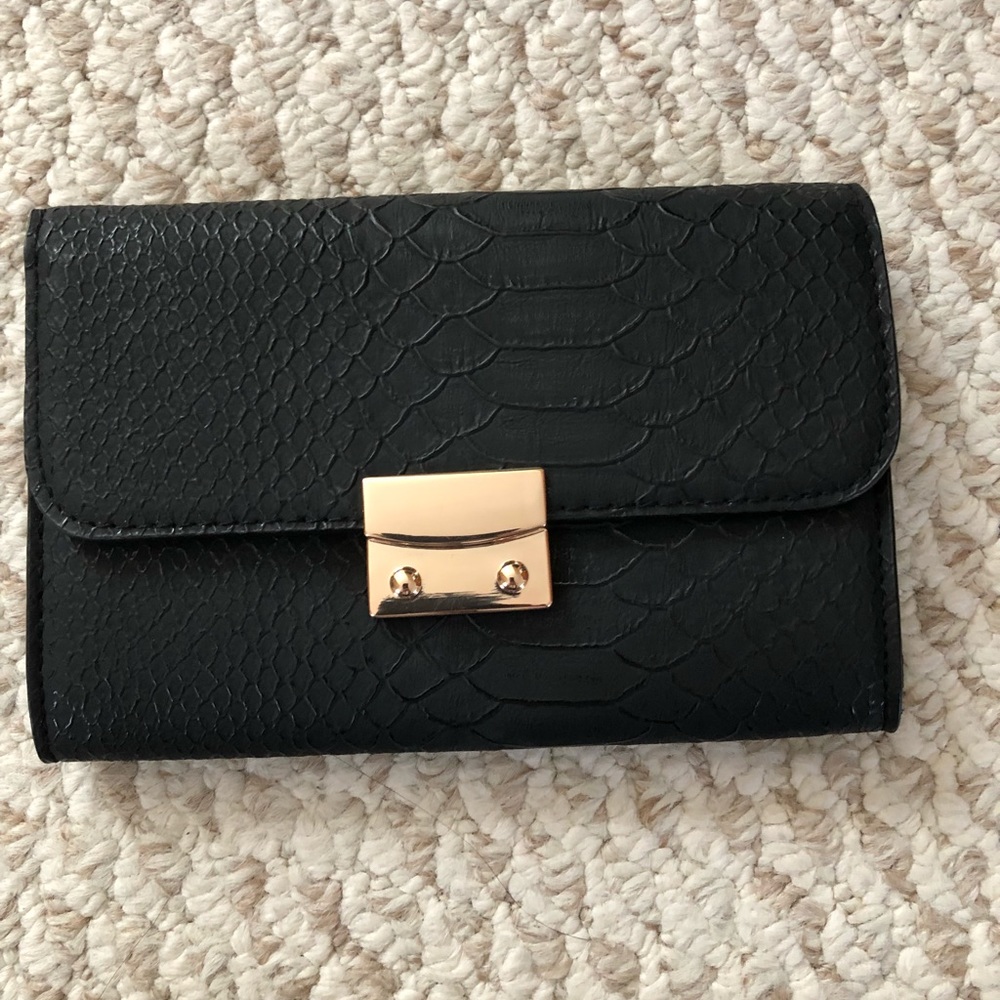 Black leather clutch